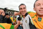 22 July 2012; Donegal manager Jim McGuinness celebrates with fans after the game. Ulster GAA Football Senior Championship Final, Donegal v Down, St. Tiernach's Park, Clones, Co. Monaghan. Photo by Sportsfile