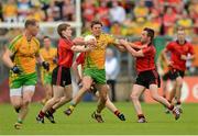 22 July 2012; Ryan Bradley, Donegal, in action against Conor Maginn, left, and Mark Poland, Down. Ulster GAA Football Senior Championship Final, Donegal v Down, St. Tiernach's Park, Clones, Co. Monaghan. Photo by Sportsfile