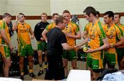 22 July 2012; Down manager James McCartan congratulates some of the Donegal players in their dressing room after the game. Ulster GAA Football Senior Championship Final, Donegal v Down, St. Tiernach's Park, Clones, Co. Monaghan. Picture credit: Oliver McVeigh / SPORTSFILE