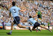 22 July 2012; Brian Farrell, Meath, has a shot on goal despite the efforts of Cian O'Sullivan, Dublin. Leinster GAA Football Senior Championship Final, Dublin v Meath, Croke Park, Dublin. Picture credit: Brian Lawless / SPORTSFILE