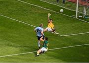 22 July 2012; Eoghan O'Gara, Dublin, kicks the ball past Meath goalkeeper David Gallagher, the umpire initially signalled that the shot had gone wide, but referee Marty Duffy over-ruled him after seeing the replay in the big screen. Leinster GAA Football Senior Championship Final, Dublin v Meath, Croke Park, Dublin. Picture credit: Dáire Brennan / SPORTSFILE