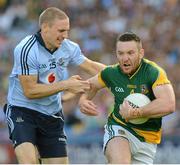 22 July 2012; Micky Burke, Meath, in action against Eoghan O'Gara, Dublin. Leinster GAA Football Senior Championship Final, Dublin v Meath, Croke Park, Dublin. Picture credit: Brian Lawless / SPORTSFILE