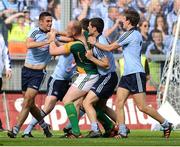 22 July 2012; Joe Sheridan, Meath, tussles with Dublin players, from left to right, James McCarthy, Rory O'Carroll and Michael Fitzsimons. Leinster GAA Football Senior Championship Final, Dublin v Meath, Croke Park, Dublin. Picture credit: David Maher / SPORTSFILE