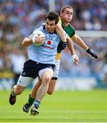 22 July 2012; Michael Darragh MacAuley, Dublin, is tackled by Meath's Bryan Menton. Leinster GAA Football Senior Championship Final, Dublin v Meath, Croke Park, Dublin. Picture credit: Ray McManus / SPORTSFILE