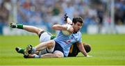 22 July 2012; Michael Darragh MacAuley, Dublin, is tackled by Meath's Bryan Menton. Leinster GAA Football Senior Championship Final, Dublin v Meath, Croke Park, Dublin. Picture credit: Ray McManus / SPORTSFILE