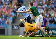 22 July 2012; Bernard Brogan, Dublin, is tackled by Meath full back Kevin Reilly and goalkeeper David Gallagher, but was ultimately penalised for over carrying the ball. Leinster GAA Football Senior Championship Final, Dublin v Meath, Croke Park, Dublin. Picture credit: Ray McManus / SPORTSFILE