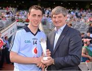 22 July 2012; Dublin forward Cormac Costello is presented with his Electric Ireland Man of the Match award by Pat O'Doherty, Chief Executive of ESB. Electric Ireland Leinster GAA Football Minor Championship Final, Dublin v Meath, Croke Park, Dublin. Picture credit: Ray McManus / SPORTSFILE