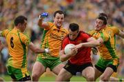 22 July 2012; Dan Gordon, Down, in action against Karl Lacey, Michael Murphy and David Walsh, Donegal. Ulster GAA Football Senior Championship Final, Donegal v Down, St. Tiernach's Park, Clones, Co. Monaghan. Picture credit: Oliver McVeigh / SPORTSFILE