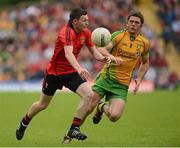 22 July 2012; Donal O'Hare, Down, in action against Ryan Bradley, Donegal. Ulster GAA Football Senior Championship Final, Donegal v Down, St. Tiernach's Park, Clones, Co. Monaghan. Picture credit: Oliver McVeigh / SPORTSFILE
