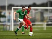 4 October 2017; Thomas Byrne of Republic of Ireland in action against Farid Nabiyev of Azerbaijan during the UEFA European U19 Championship Qualifier match between Republic of Ireland and Azerbaijan at Regional Sports Centre in Waterford. Photo by Seb Daly/Sportsfile