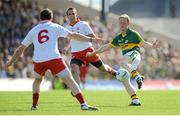 21 July 2012; Colm Cooper, Kerry, in action against Conor Gormley, left, and Mark Donnelly, Tyrone. GAA Football All-Ireland Senior Championship Qualifier, Round 3, Kerry v Tyrone, Fitzgerald Stadium, Killarney, Co. Kerry. Picture Credit: Diarmuid Greene / SPORTSFILE