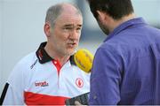 21 July 2012; Tyrone manager Mickey Harte is interviewed for radio after the game. GAA Football All-Ireland Senior Championship Qualifier, Round 3, Kerry v Tyrone, Fitzgerald Stadium, Killarney, Co. Kerry. Picture Credit: Diarmuid Greene / SPORTSFILE