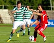 24 July 2012; Ronan Finn, Shamrock Rovers, in action against Marko Andjelkovic, FK Ekranas. UEFA Champions League, 2nd Qualifying Round, 2nd Leg, FK Ekranas v Shamrock Rovers, Aukštaitija Stadium, Panevežys, Lithuania. Picture credit: Robertas Dackus / SPORTSFILE