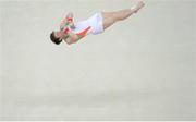 25 July 2012; Ireland's Kieran Behan during the floor exercise at Artistic Gymnastics traininig ahead of the London 2012 Olympic Games. London 2012 Olympic Games, Artistic Gymnastics Training, North Greenwich Arena, Greenwich, London, England. Picture credit: Stephen McCarthy / SPORTSFILE