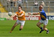 21 July 2012; Kevin Niblock, Antrim, in action against Andrew Morrissey, Tipperary. GAA Football All-Ireland Senior Championship Qualifier, Round 3, Tipperary v Antrim, Semple Stadium, Thurles, Co. Tipperary. Picture Credit: Barry Cregg / SPORTSFILE