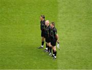 22 July 2012; Referee Marty Duffy, centre, with linesmen, Maurice Deegan, left, and Syl Doyle, right, stand together for the national anthem. Leinster GAA Football Senior Championship Final, Dublin v Meath, Croke Park, Dublin. Picture credit: Dáire Brennan / SPORTSFILE