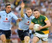 22 July 2012; Micky Burke, Meath, in action against Eoghan O'Gara and James McCarthy, left, Dublin. Leinster GAA Football Senior Championship Final, Dublin v Meath, Croke Park, Dublin. Picture credit: Brian Lawless / SPORTSFILE