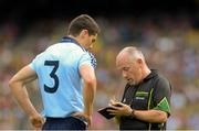 22 July 2012; Referee Marty Duffy takes the name of Rory O'Carroll, Dublin. Leinster GAA Football Senior Championship Final, Dublin v Meath, Croke Park, Dublin. Picture credit: Brian Lawless / SPORTSFILE