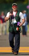 26 July 2012; Ireland's Derek Burnett arrives at the Shotgun Range for Trap Shooting training ahead of the London 2012 Olympic Games. London 2012 Olympic Games, Shooting Training, Royal Artillery Barracks, Greenwich, London, England. Picture credit: Stephen McCarthy / SPORTSFILE