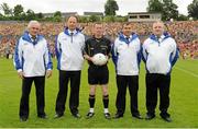 22 July 2012; Referee Joe McQuillan, centre, with his umpires, from left, Tommy O'Reilly, Kieran Brady, Jimmy Galligan and TP Gray. Ulster GAA Football Senior Championship Final, Donegal v Down, St. Tiernach's Park, Clones, Co. Monaghan. Picture credit: Oliver McVeigh / SPORTSFILE