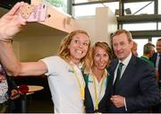 27 July 2012; An Taoiseach Enda Kenny, T.D., poses for a photo with Irish athletes Aileen Morrison, left, triathlon, and Olive Loughnane, race walking, at their training base in St. Mary's University College ahead of the London 2012 Olympic Games. Teddington, Middlesex, London, England. Picture credit: Brendan Moran / SPORTSFILE