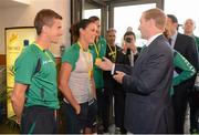 27 July 2012; An Taoiseach Enda Kenny, T.D., meets Irish athletes Robert and Marian Heffernan at their training base in St. Mary's University College ahead of the London 2012 Olympic Games. Teddington, Middlesex, London, England. Picture credit: Brendan Moran / SPORTSFILE