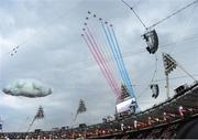 27 July 2012; The Red Arrows perform a display during the prologue of the opening ceremony of the London 2012 Olympic Games. London 2012 Olympic Games, Opening Ceremony, Olympic Stadium, Olympic Park, Stratford, London, England. Picture credit: Stephen McCarthy / SPORTSFILE