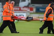 27 July 2012; Patrick McEleney, Derry City, is stretchered off during the first half. Airtricity League Premier Division, Derry City v Shamrock Rovers, Brandywell, Derry. Picture credit: Oliver McVeigh / SPORTSFILE