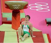 28 July 2012; Ireland's Kieran Behan reacts after competing in the vault routine during the men's qualification. London 2012 Olympic Games, Artistic Gymnastics, North Greenwich Arena, Greenwich, London, England. Picture credit: Stephen McCarthy / SPORTSFILE