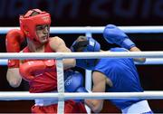 28 July 2012; John Joe Nevin, Ireland, left, exchanges punches with Dennis Ceylan, Denmark, during their men's bantam 56kg round of 32 contest. London 2012 Olympic Games, Boxing, South Arena 2, ExCeL Arena, Royal Victoria Dock, London, England. Picture credit: David Maher / SPORTSFILE