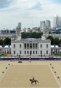 28 July 2012; Ireland's Joseph Murphy, on Electric Cruise, competes during the dressage discipline of the three day eventing competition. London 2012 Olympic Games, Equestrian Greenwich Park, Greenwich, London, England. Picture credit: Stephen McCarthy / SPORTSFILE