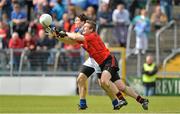 28 July 2012; Ciarán McDonald, Tipperary, in action against Eoin McCartan, Down. GAA Football All-Ireland Senior Championship Qualifier, Round 4, Down v Tipperary, Cusack Park, Mullingar, Co. Westmeath. Picture credit: Barry Cregg / SPORTSFILE