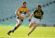 28 July 2012; Gary Brennan, Clare, in action against Donnchadh Walsh, Kerry. GAA Football All-Ireland Senior Championship Qualifier, Round 4, Kerry v Clare, Gaelic Grounds, Limerick. Picture credit: Diarmuid Greene / SPORTSFILE