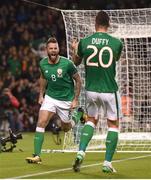 6 October 2017; Daryl Murphy, left, of Republic of Ireland celebrates with team-mate Shane Duffy after scoring his side's first goal during the FIFA World Cup Qualifier Group D match between Republic of Ireland and Moldova at Aviva Stadium, in Dublin. Photo by Stephen McCarthy/Sportsfile