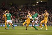6 October 2017; Daryl Murphy of Republic of Ireland shoots to score his side's first goal despite the efforts of Alexandru Epureanu of Moldova during the FIFA World Cup Qualifier Group D match between Republic of Ireland and Moldova at Aviva Stadium in Dublin. Photo by Eóin Noonan/Sportsfile