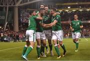 6 October 2017; Daryl Murphy, second from left, of Republic of Ireland celebrates with team-mates, from left to right, Shane Long, Shane Duffy and Stephen Ward after scoring his side's first goal during the FIFA World Cup Qualifier Group D match between Republic of Ireland and Moldova at Aviva Stadium, in Dublin. Photo by Stephen McCarthy/Sportsfile