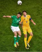 6 October 2017; Alexandru Epureanu of Moldova in action against Shane Long of Republic of Ireland during the FIFA World Cup Qualifier Group D match between Republic of Ireland and Moldova at Aviva Stadium in Dublin. Photo by Brendan Moran/Sportsfile
