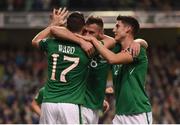 6 October 2017; Daryl Murphy of Republic of Ireland celebrates after scoring his side's second goal with team-mates Stephen Ward, left and Callum O'Dowda, during the FIFA World Cup Qualifier Group D match between Republic of Ireland and Moldova at Aviva Stadium in Dublin. Photo by Stephen McCarthy/Sportsfile