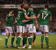 6 October 2017; Daryl Murphy, 8, is congratulated by his Republic of Ireland team-mate Shane Duffy after scoring their second goal during the FIFA World Cup Qualifier Group D match between Republic of Ireland and Moldova at Aviva Stadium in Dublin. Photo by Stephen McCarthy/Sportsfile