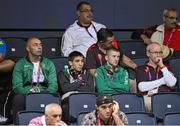 29 July 2012; Team Ireland boxing coach Pete Taylor, left, alongside team Ireland boxers Michael Conlan, centre, and Paddy Barnes look on from the stands ahead of Adam Nolan's welter 69kg round of 32 contest bout against Carlos Sanchez Estacio, Ecuador. London 2012 Olympic Games, Boxing, South Arena 2, ExCeL Arena, Royal Victoria Dock, London, England. Picture credit: David Maher / SPORTSFILE