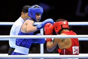29 July 2012; Adam Nolan, Ireland, left, exchanges punches with Carlos Sanchez Estacio, Ecuador, during their men's welter 69kg round of 32 contest. London 2012 Olympic Games, Boxing, South Arena 2, ExCeL Arena, Royal Victoria Dock, London, England. Picture credit: David Maher / SPORTSFILE