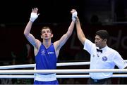 29 July 2012; Adam Nolan, Ireland, celebrates as he is declared winner over Carlos Sanchez Estacio, Ecuador, in their men's welter 69kg round of 32 contest. London 2012 Olympic Games, Boxing, South Arena 2, ExCeL Arena, Royal Victoria Dock, London, England. Picture credit: David Maher / SPORTSFILE