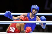 29 July 2012; Adam Nolan, Ireland, right, exchanges punches with Carlos Sanchez Estacio, Ecuador, during their men's welter 69kg round of 32 contest. London 2012 Olympic Games, Boxing, South Arena 2, ExCeL Arena, Royal Victoria Dock, London, England. Picture credit: David Maher / SPORTSFILE