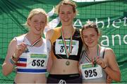 28 July 2012; Winner of the Girl's Under-18 200m event Cliodhna Manning, Kilkenny City Harriers A.C., Co. Kilkenny, centre, with second placed Sarah Mc Carthy, Mid Sutton A.C., Co. Dublin, left, and third placed Jade Leahy, DSD A.C., Dublin. Woodie’s DIY Juvenile Track and Field Championships of Ireland, Tullamore Harriers Stadium, Tullamore, Co. Offaly. Picture credit: Tomas Greally / SPORTSFILE