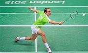 30 July 2012; Ireland's Scott Evans competes during the men's singles group play stage match against China's Lin Dan. London 2012 Olympic Games, Badminton, Wembley Arena, Wembley, London, England. Picture credit: Stephen McCarthy / SPORTSFILE