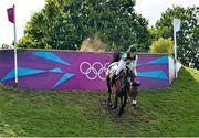 30 July 2012; Ireland's Camilla Speirs, on Portersize Just A Jiff, nearly dismounts while competing during the individual and team eventing cross country. London 2012 Olympic Games, Equestrian Greenwich Park, Greenwich, London, England. Picture credit: Brendan Moran / SPORTSFILE