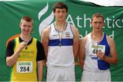 28 July 2012; Winner of the Boy's Under-18 Discus event Michael Hanlon, Dunboyne A.C., Co. Meath, centre, with second placed Andrew Mc Carthy, Gneeveguilla A.C., Co. Kerry, left, and third placed James Mulligan,  Tullamore Harriers A.C., Co. Offaly. Woodie’s DIY Juvenile Track and Field Championships of Ireland, Tullamore Harriers Stadium, Tullamore, Co. Offaly. Picture credit: Tomas Greally / SPORTSFILE