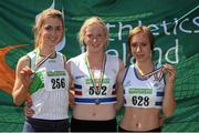 28 July 2012; Winner of the Girl's Under-18 Long Jump event Sarah Mc Carthy, Mid Sutton A.C., Co. Dublin, centre, with second placed Marie Heelan, Emerald A.C., Co. Limerick, left, and third placed Vivian Fleisher, Celbridge A.C., Co. Kildare. Woodie’s DIY Juvenile Track and Field Championships of Ireland, Tullamore Harriers Stadium, Tullamore, Co. Offaly. Picture credit: Tomas Greally / SPORTSFILE