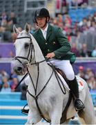 31 July 2012; Ireland's Mark Kyle, on Coolio, competes during the individual eventing showjumping discipline where he finished in 21st place. London 2012 Olympic Games, Equestrian, Greenwich Park, Greenwich, London, England. Picture credit: Brendan Moran / SPORTSFILE