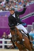 31 July 2012; Germany's Michael Jung, on Sam, celebrates after winning gold in the individual eventing showjumping discipline. London 2012 Olympic Games, Equestrian, Greenwich Park, Greenwich, London, England. Picture credit: Brendan Moran / SPORTSFILE
